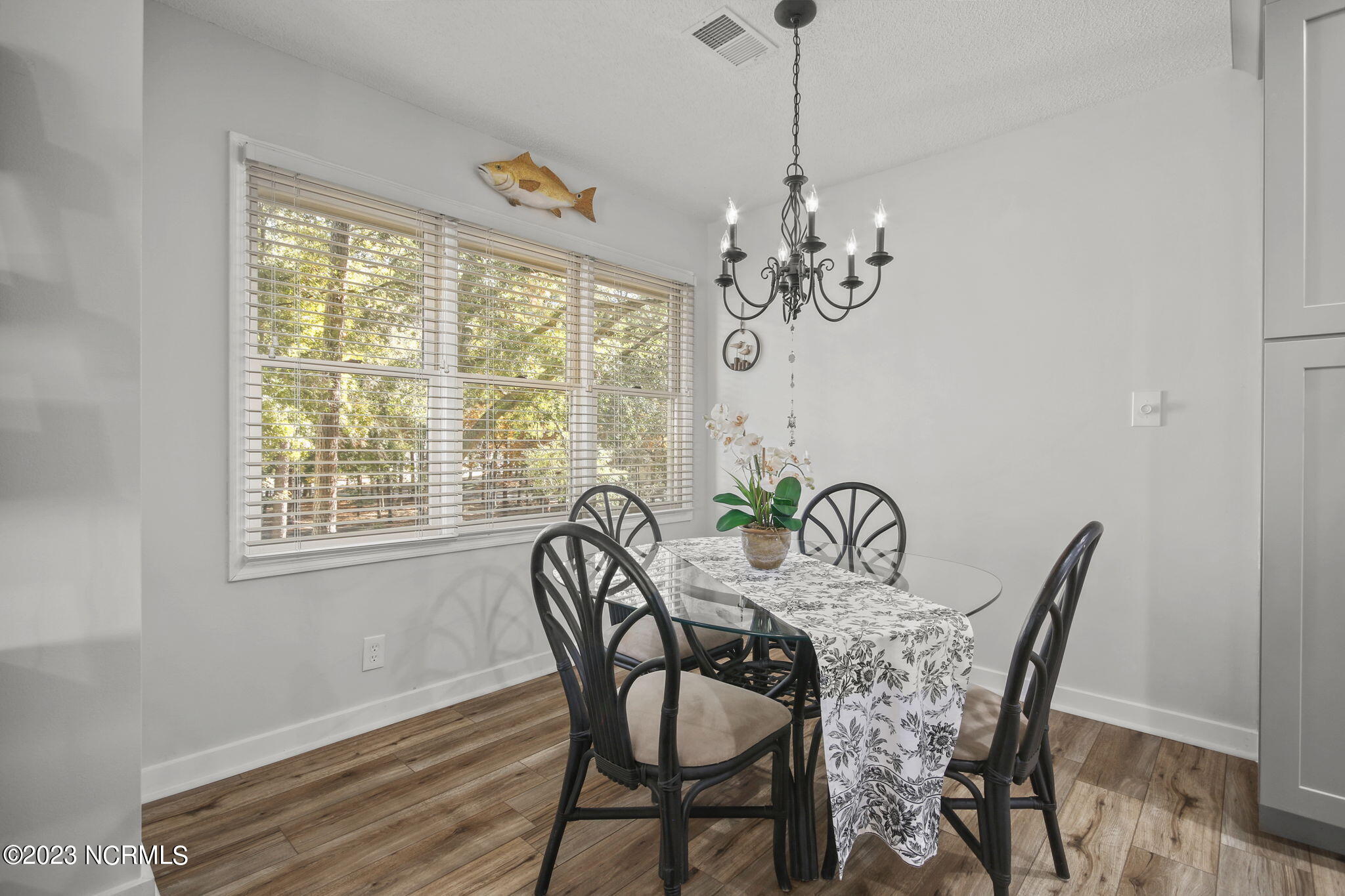 225 Clubhouse Road, Unit 706 Sunset Beach, NC 28468 - Photo 7 of 37 Dining area provides enough seating for comfortable entertaining!