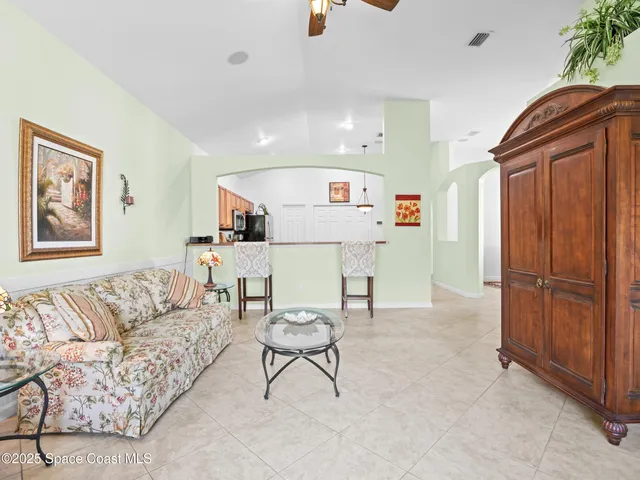 a living room with furniture and a couch