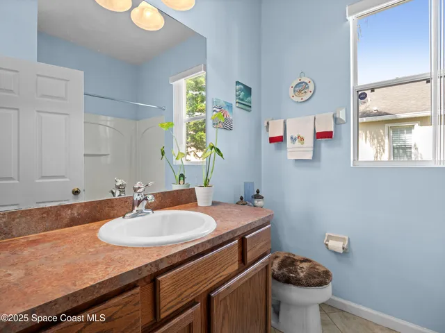 a bathroom with a sink and a toilet
