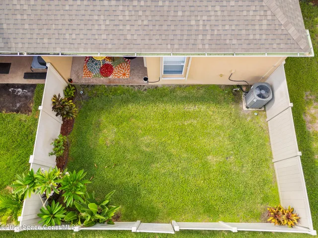 a view of swimming pool with a yard