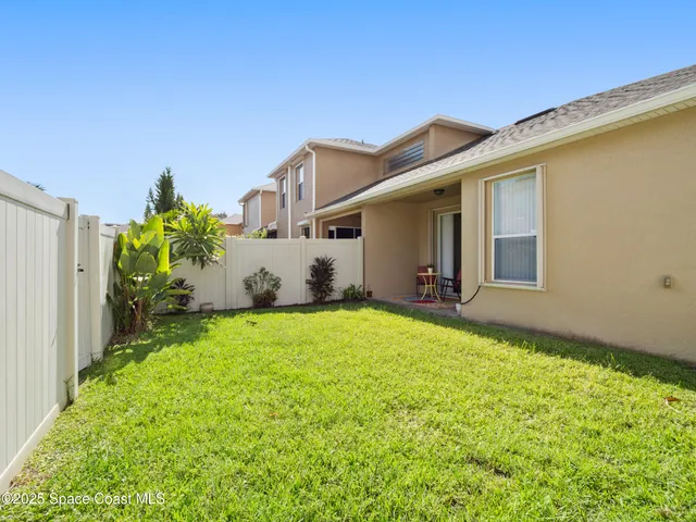 a house view with a garden space