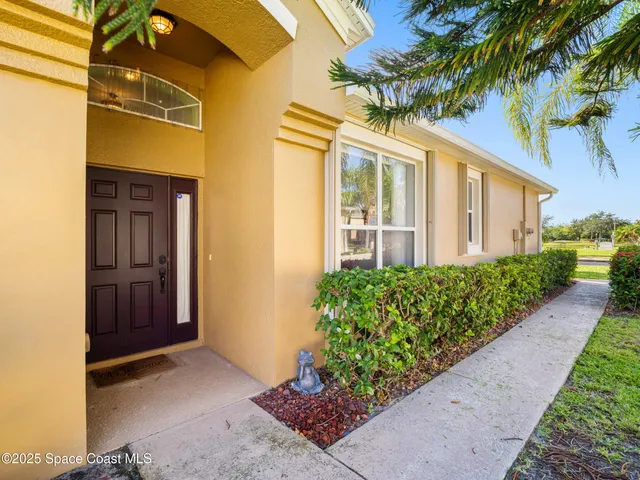 a front view of a house having yard