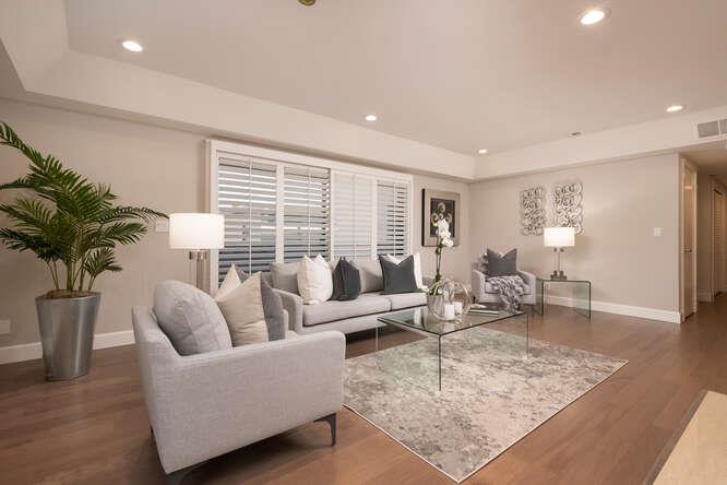 616 Ansel Road, Unit 5 Burlingame, CA 94010 - Photo 1 of 20 a living room with furniture and a large window