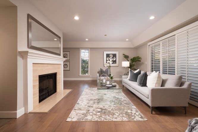 616 Ansel Road, Unit 5 Burlingame, CA 94010 - Photo 2 of 20 a living room with furniture and a fireplace