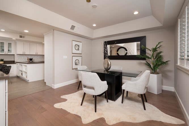 616 Ansel Road, Unit 5 Burlingame, CA 94010 - Photo 8 of 20 a living room with furniture and a potted plant