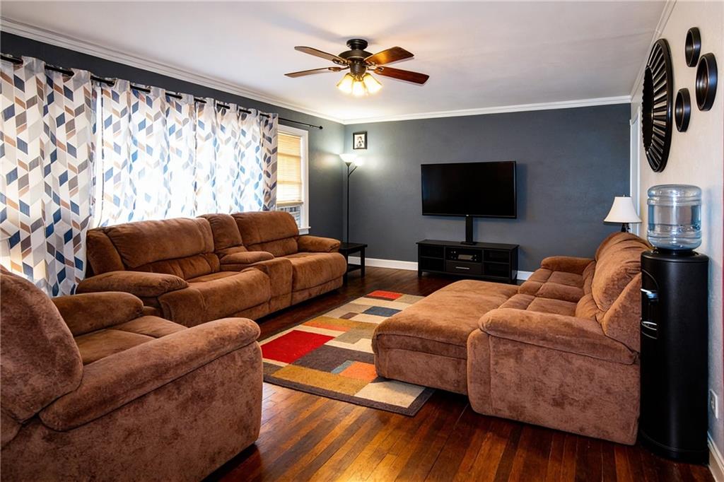 154 Privette Road Southwest Marietta, GA 30008 - Photo 11 of 28 a living room with furniture and a flat screen tv