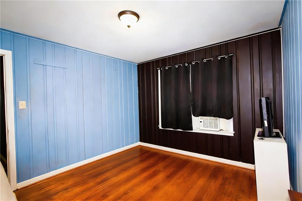 154 Privette Road Southwest Marietta, GA 30008 - Photo 25 of 28 a view of a hallway with wooden floor