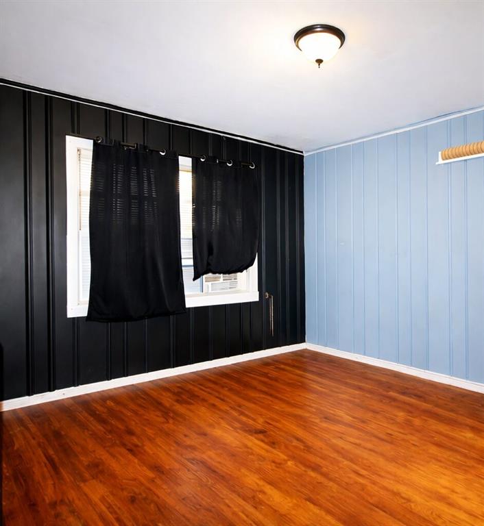 154 Privette Road Southwest Marietta, GA 30008 - Photo 26 of 28 a bedroom with a bed and a dresser