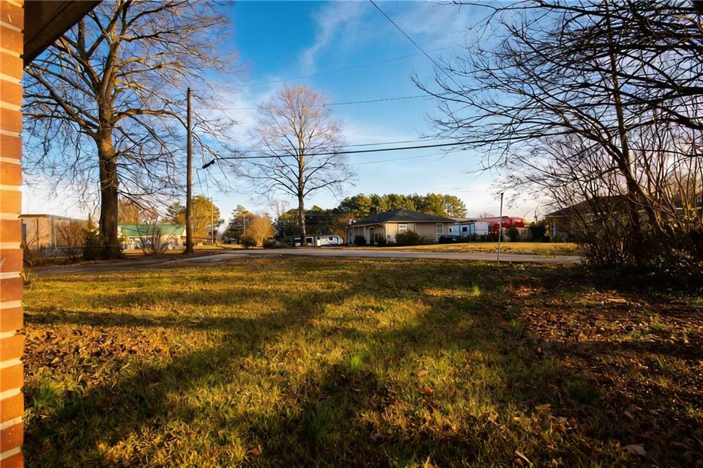 154 Privette Road Southwest Marietta, GA 30008 - Photo 4 of 28 a view of yard with large tree
