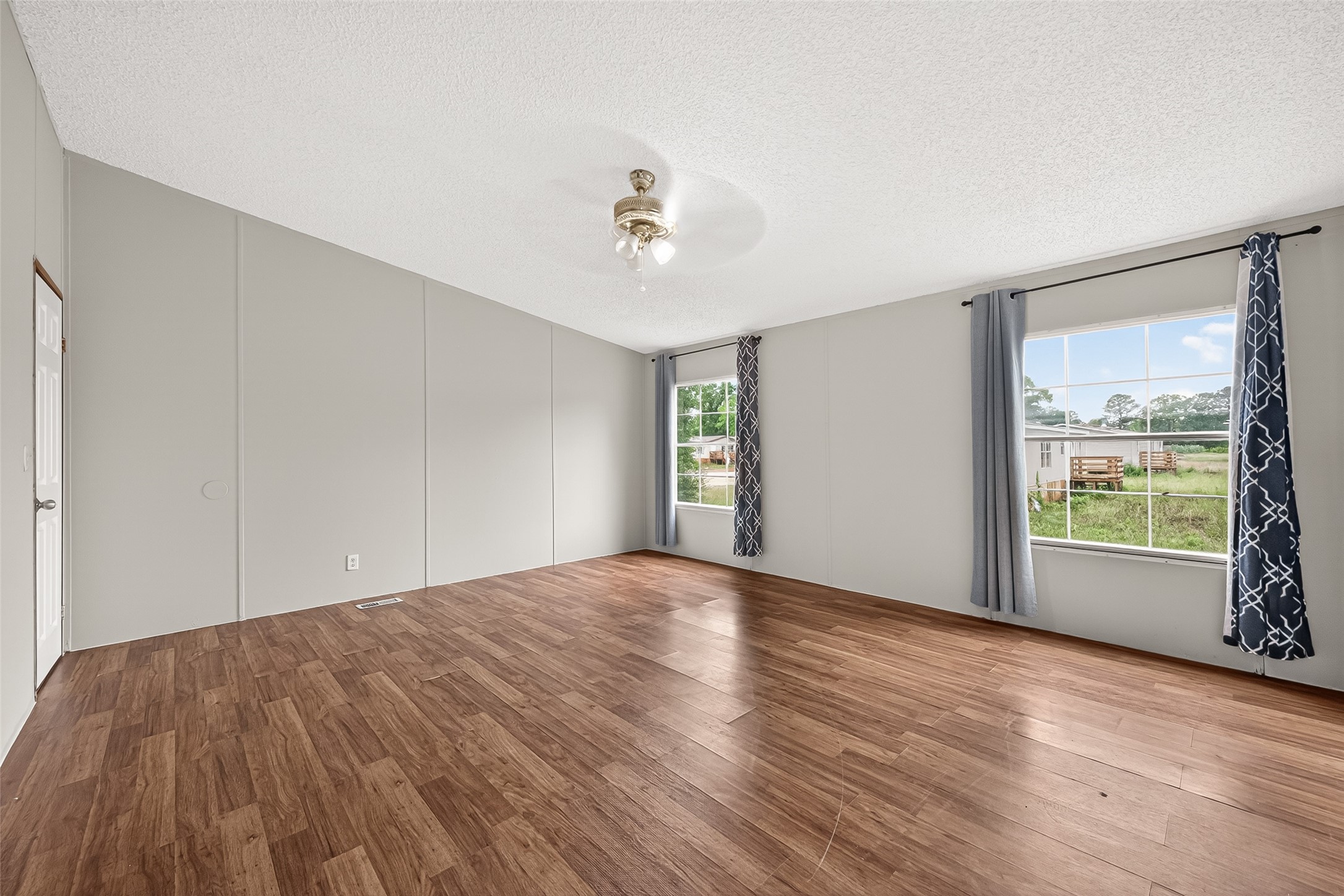 5982 Waukegan Road Conroe, TX 77306 - Photo 28 of 49 a view of an empty room with a window