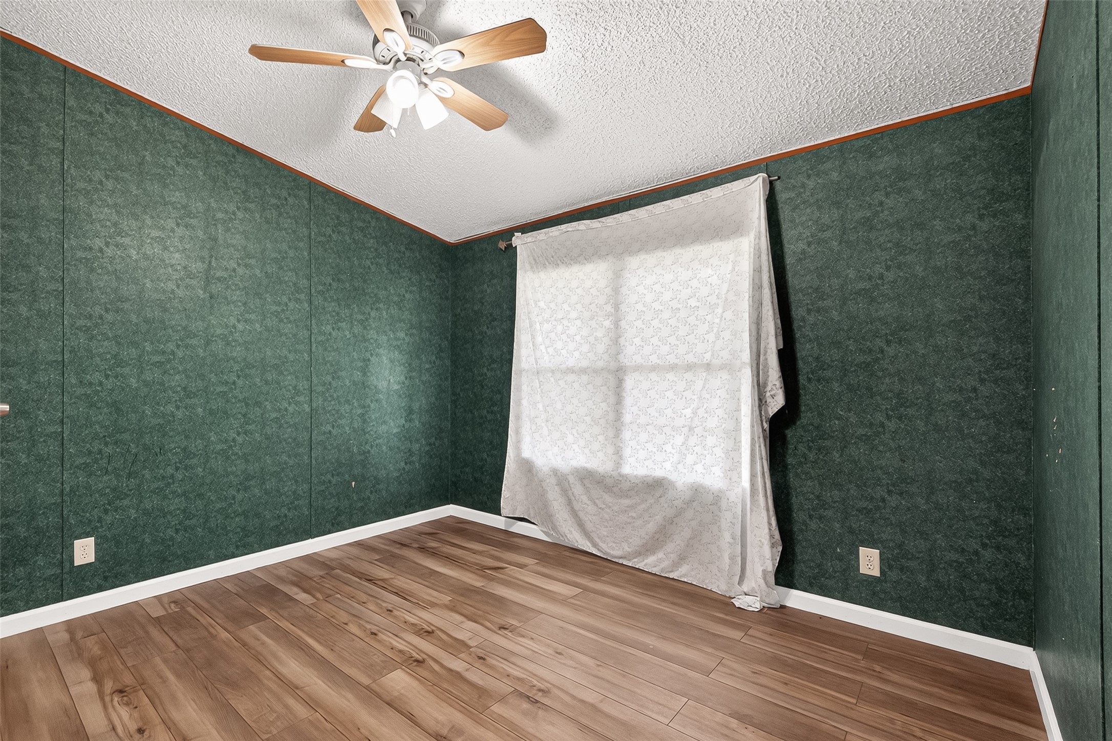 5982 Waukegan Road Conroe, TX 77306 - Photo 33 of 49 a bedroom with a bed and a window
