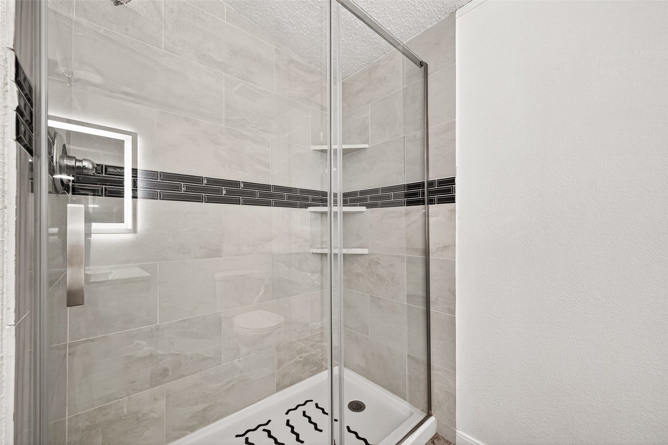 5982 Waukegan Road Conroe, TX 77306 - Photo 43 of 49 a bathroom with a shower