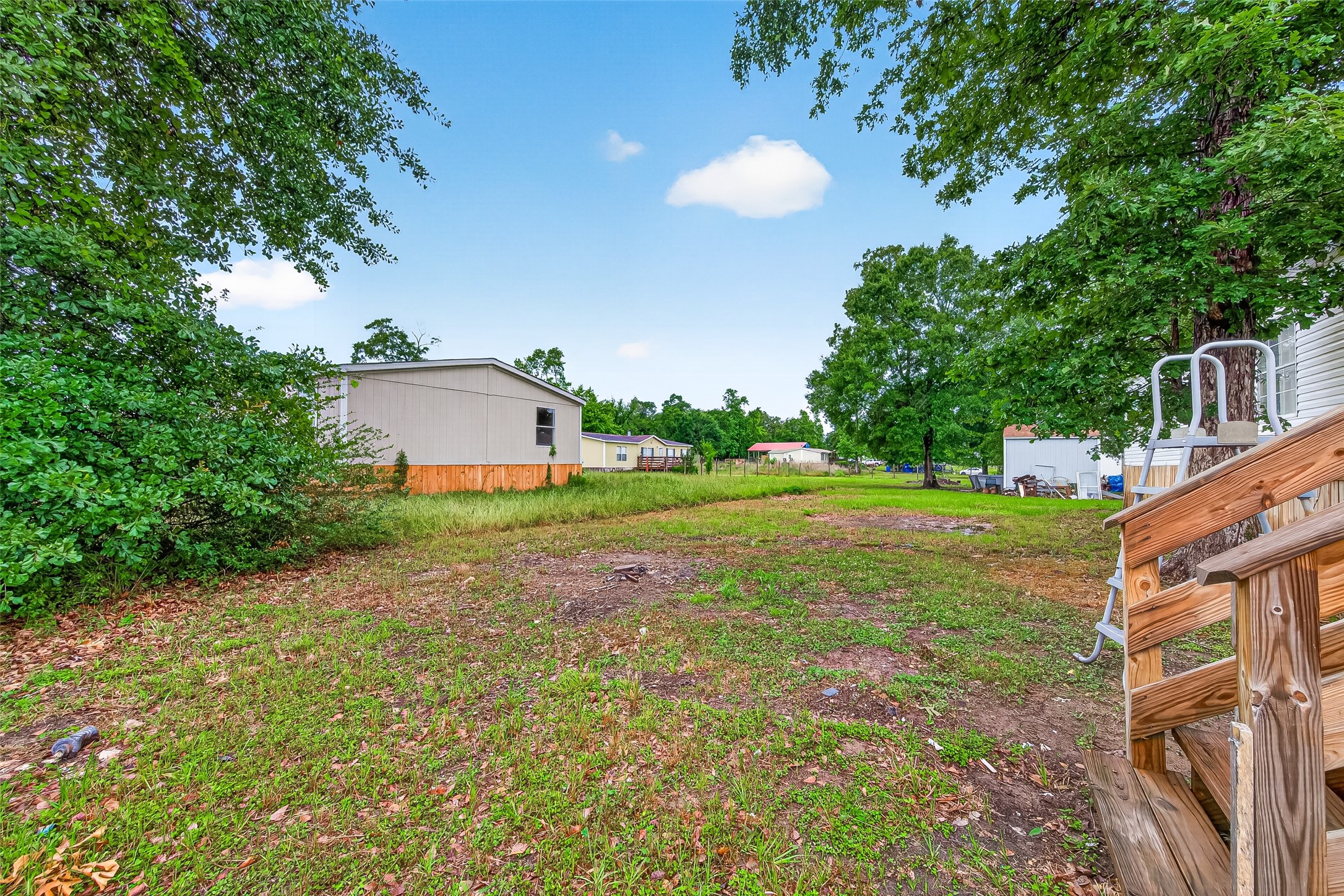 5982 Waukegan Road Conroe, TX 77306 - Photo 49 of 49 a view of a house with a backyard