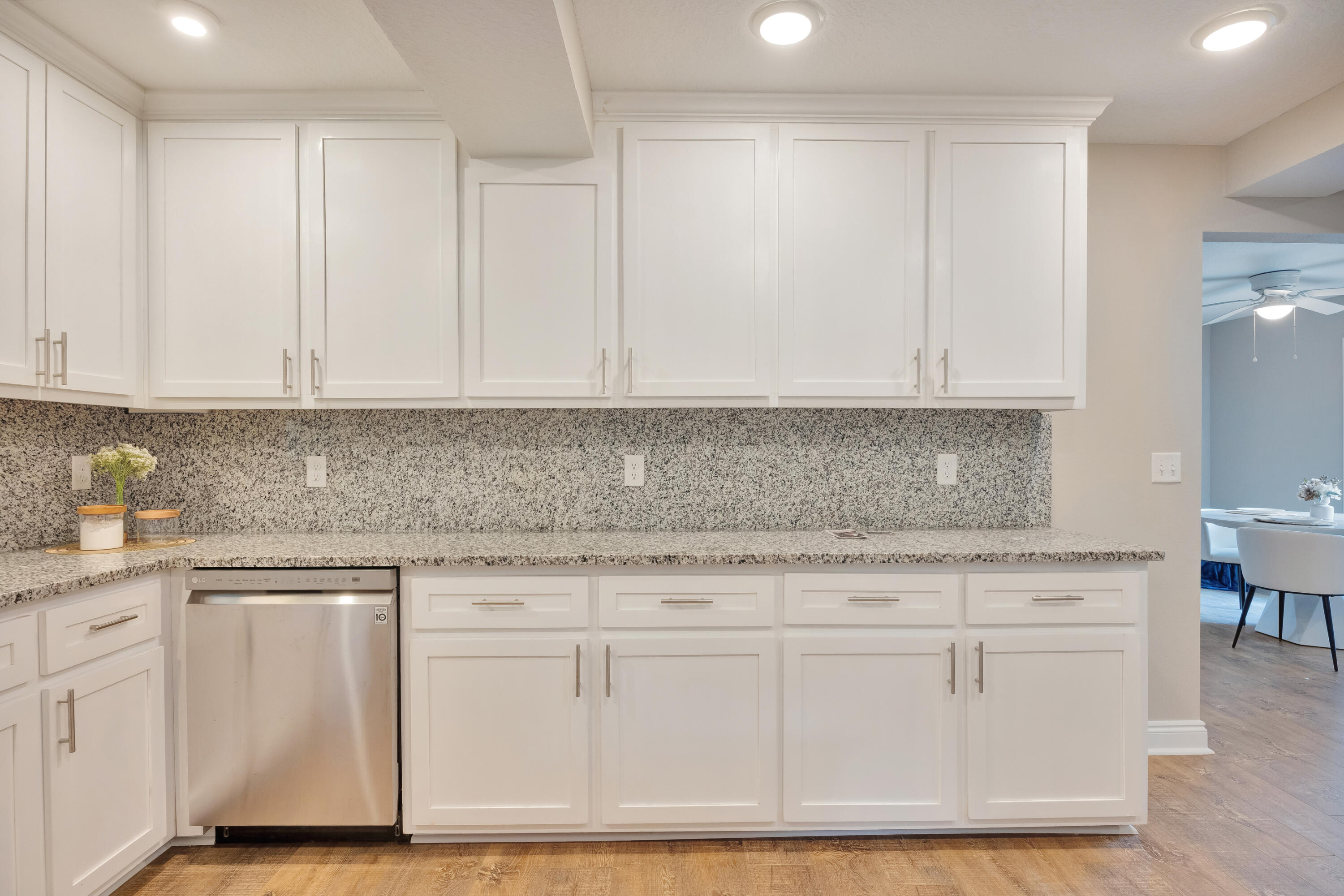147 Gillis Drive Crestview, FL 32536 - Photo 17 of 62 a kitchen with white cabinets and sink