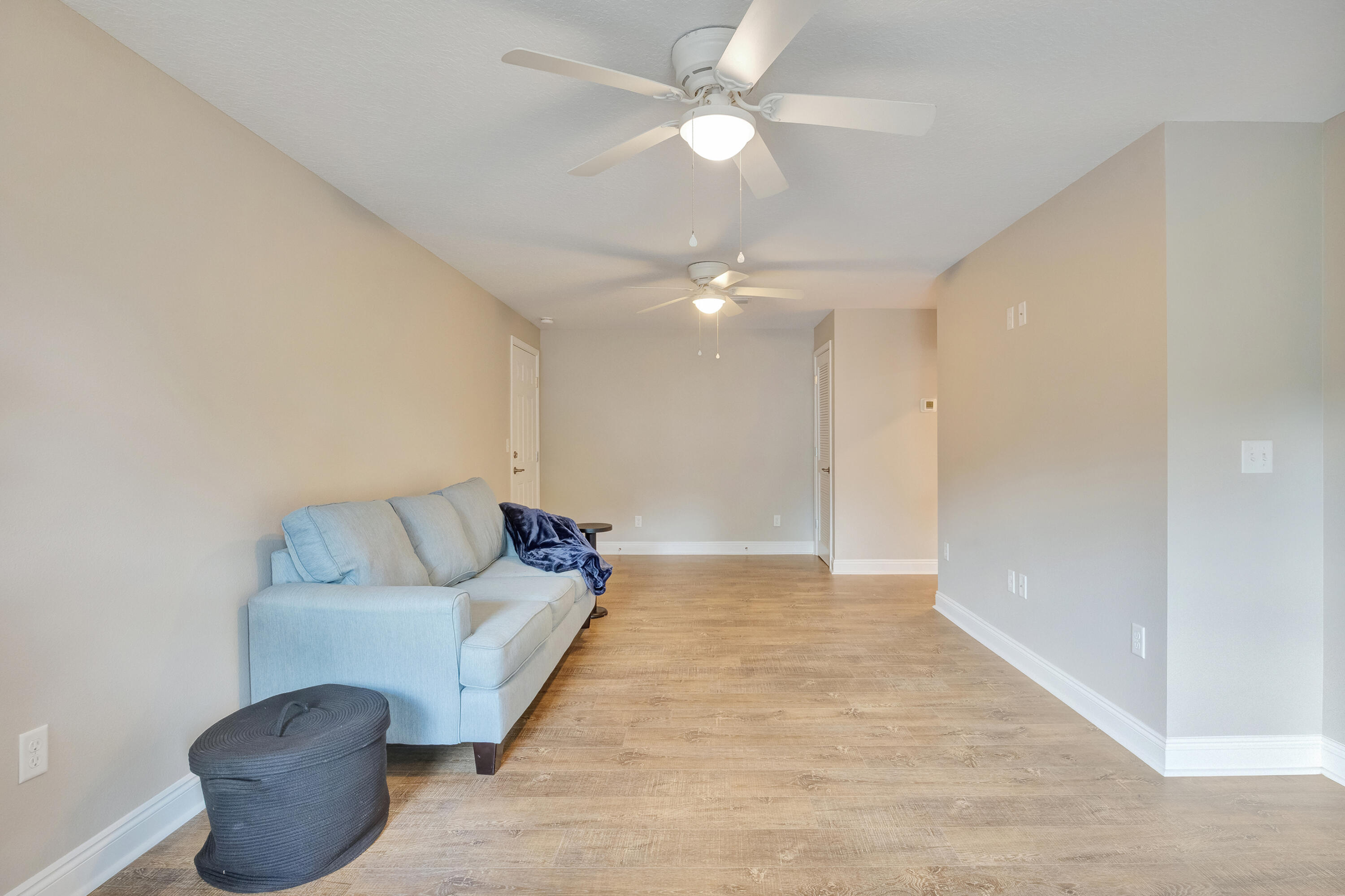 147 Gillis Drive Crestview, FL 32536 - Photo 24 of 62 a living room with furniture and a ceiling fan