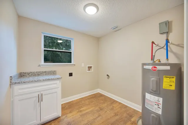 a bathroom with a toilet and a bathtub