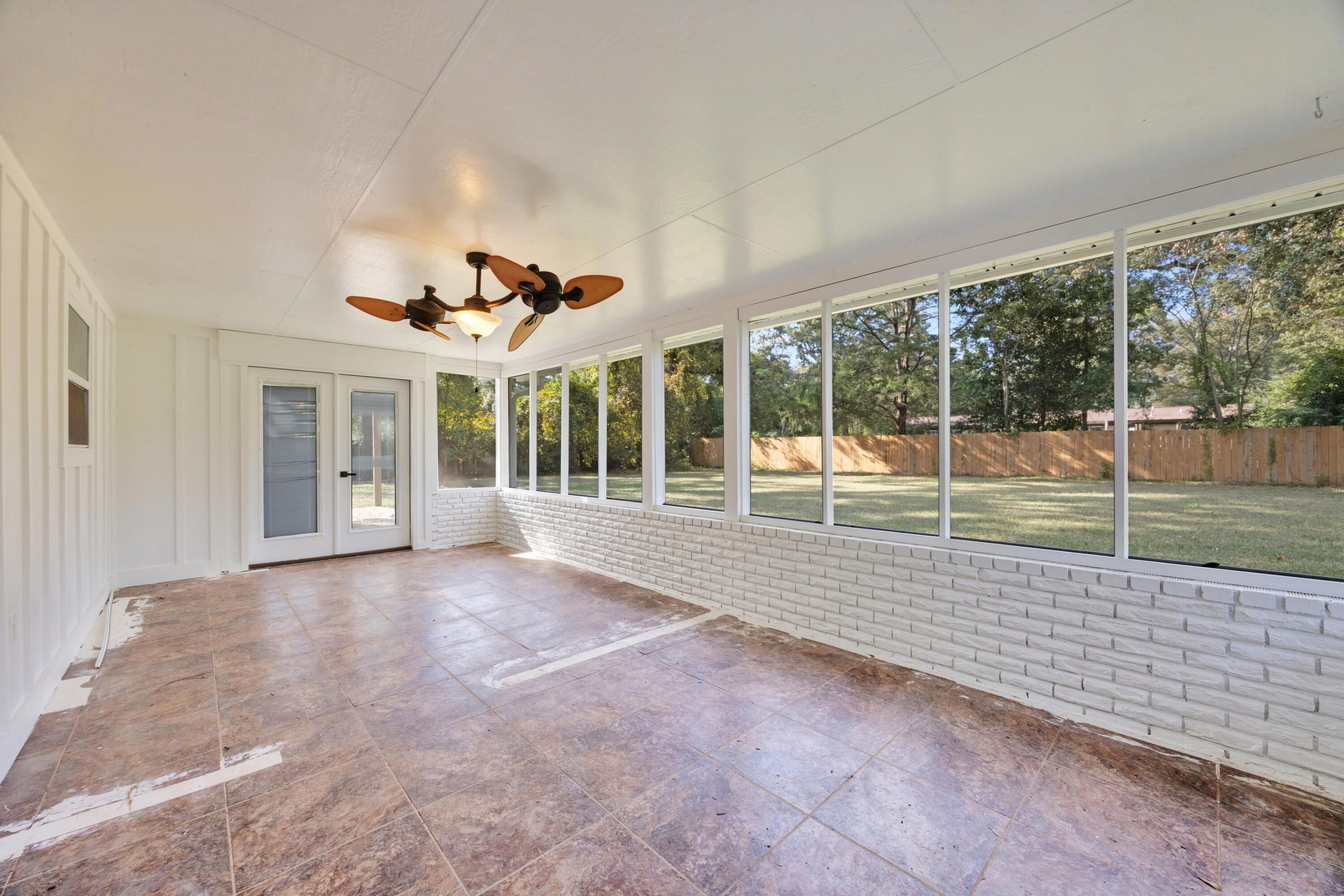147 Gillis Drive Crestview, FL 32536 - Photo 48 of 62 a view of a porch with furniture and garden