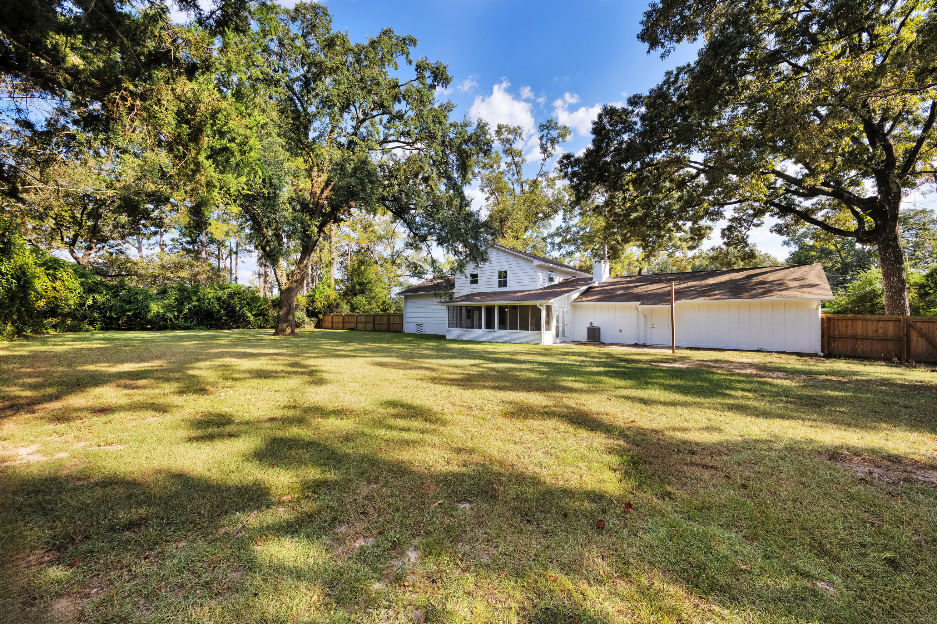 147 Gillis Drive Crestview, FL 32536 - Photo 57 of 62 a front view of a house with a yard