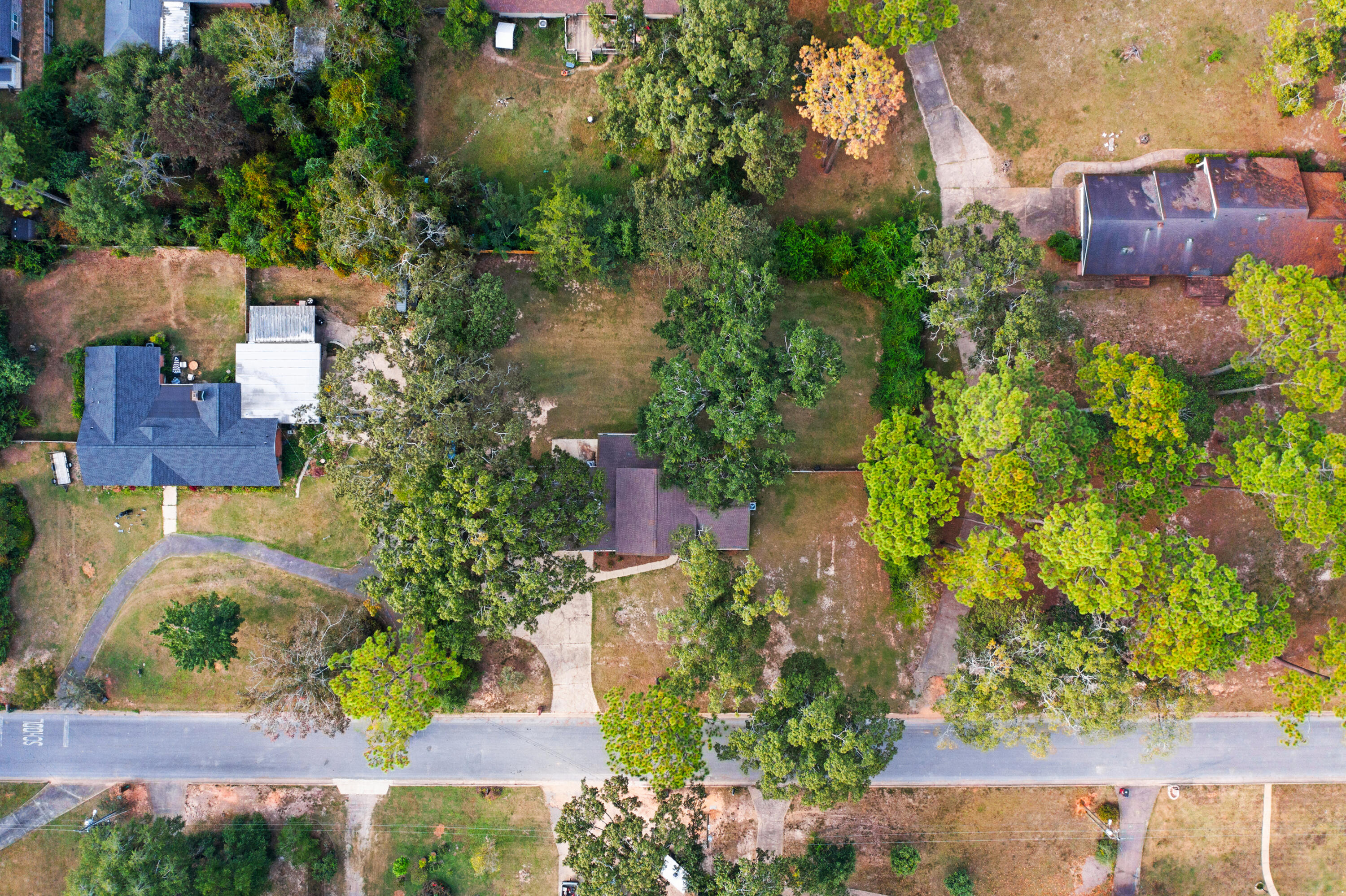 147 Gillis Drive Crestview, FL 32536 - Photo 62 of 62 an aerial view of a house with a yard and garden