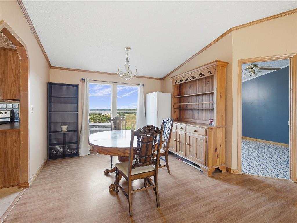 381 West McCool Road Nocona, TX 76255 - Photo 14 of 39 a dining room with furniture and window