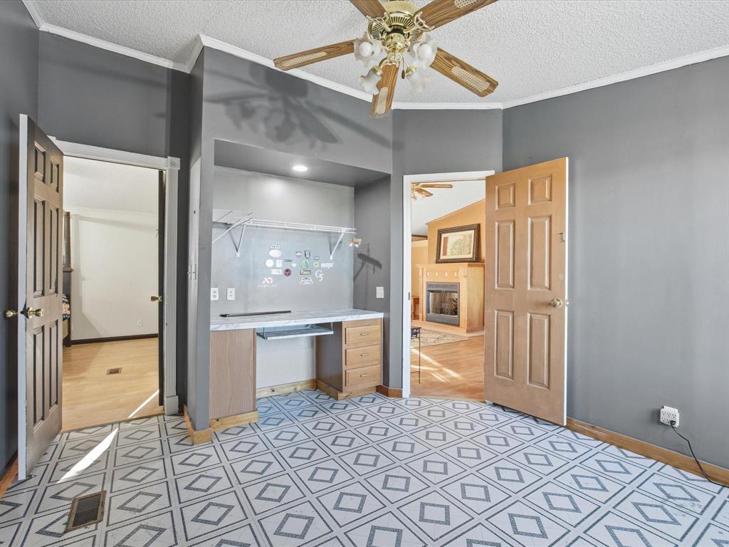 381 West McCool Road Nocona, TX 76255 - Photo 21 of 39 a bathroom with a sink and a mirror