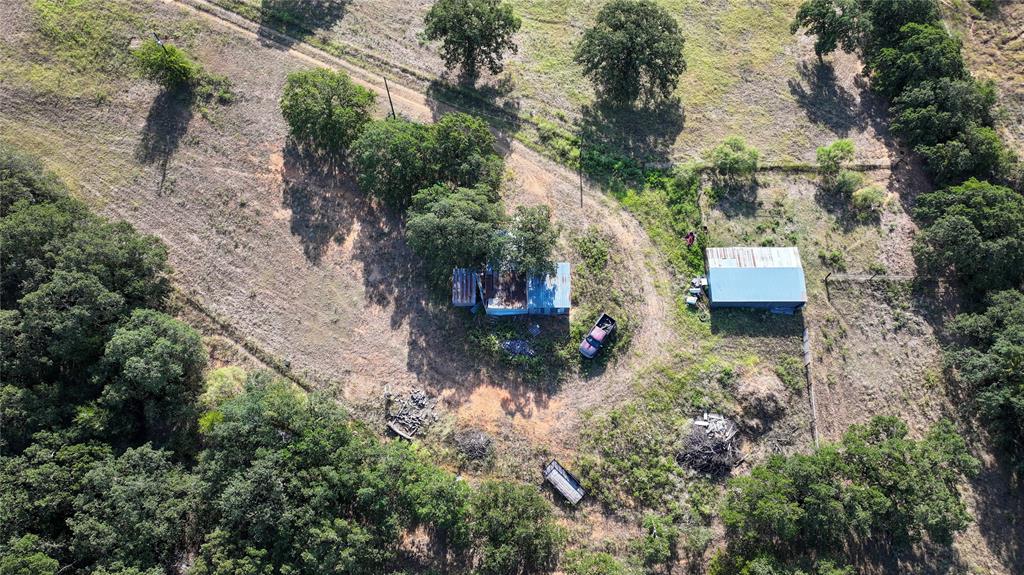 381 West McCool Road Nocona, TX 76255 - Photo 35 of 39 a view of a house with a yard