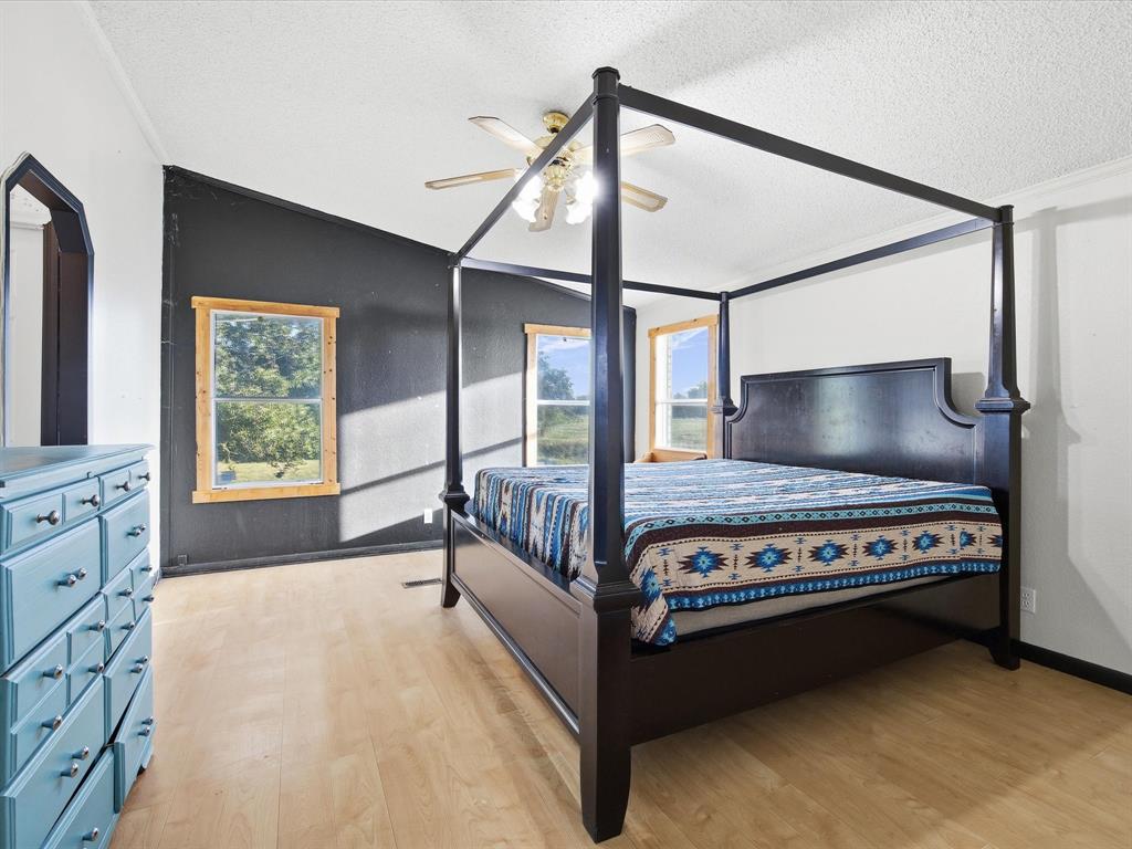 381 West McCool Road Nocona, TX 76255 - Photo 8 of 39 a view of living room with furniture and window