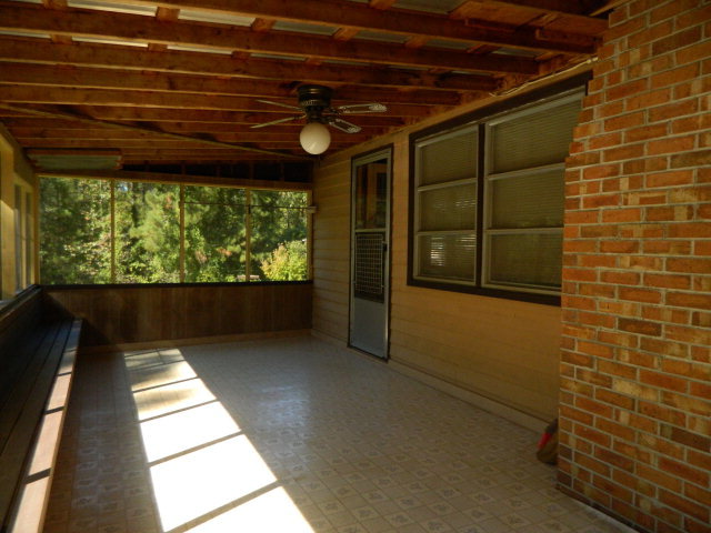 426 Huckabee Road Gray, GA 31032 - Photo 20 of 40 a view of balcony with a garden