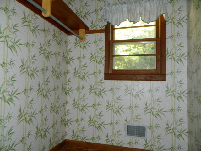 426 Huckabee Road Gray, GA 31032 - Photo 28 of 40 a bathroom with a window and a shower