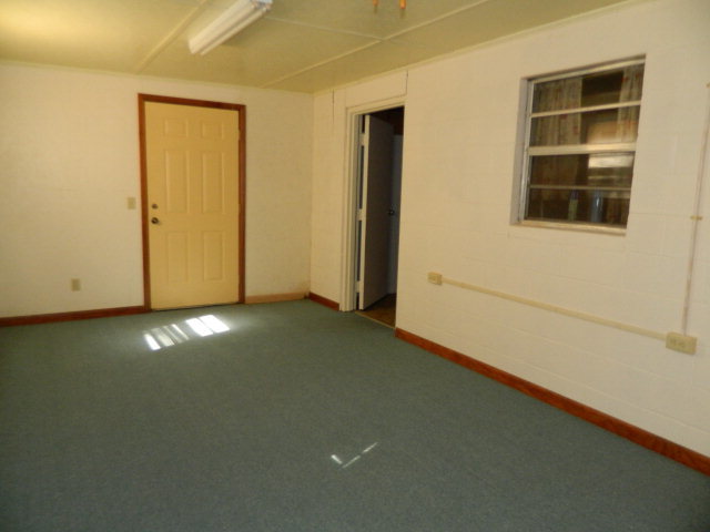 426 Huckabee Road Gray, GA 31032 - Photo 31 of 40 a view of an empty room with closet and wooden floor