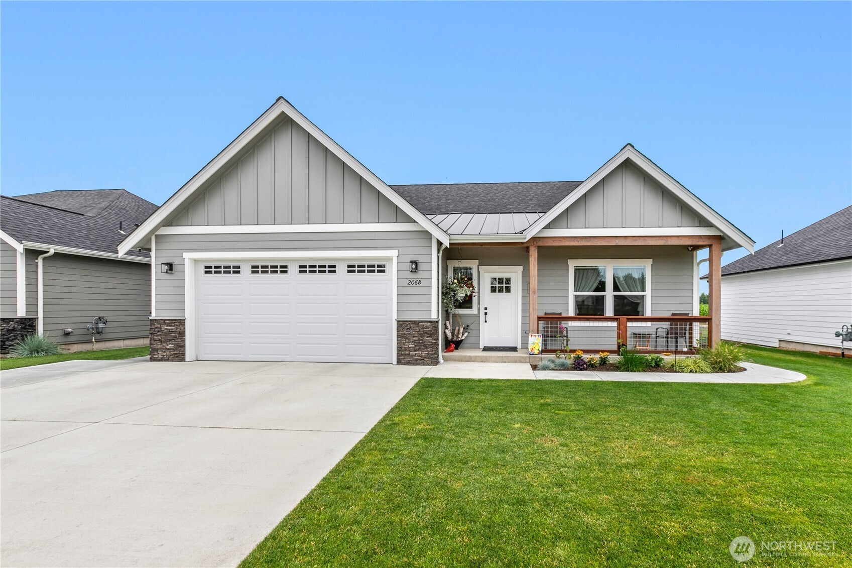 2068 Bowfin Way Lynden, WA 98264 - Photo 1 of 35 a front view of a house with a yard and porch