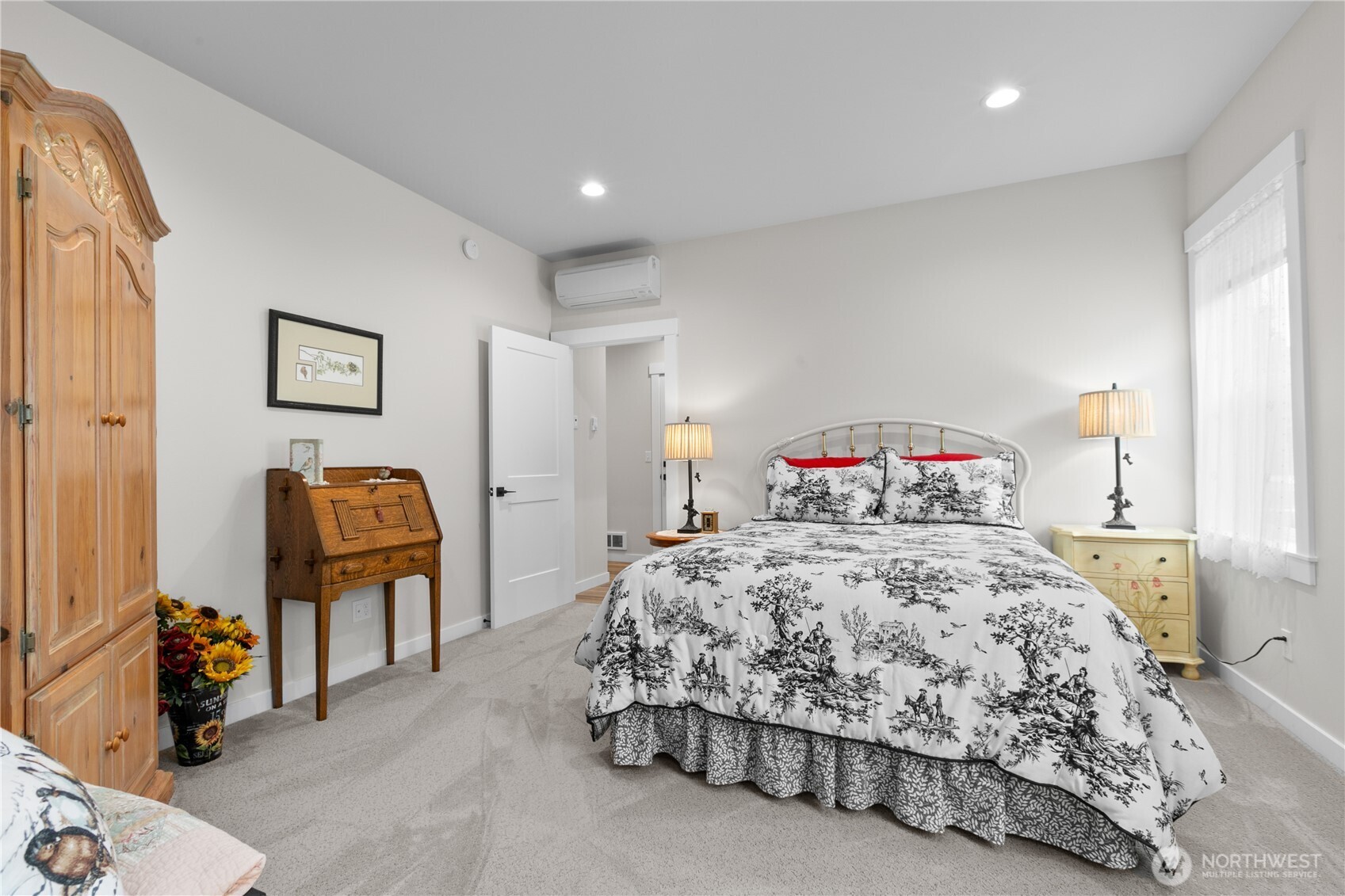 2068 Bowfin Way Lynden, WA 98264 - Photo 13 of 35 a bedroom with a bed and cabinets