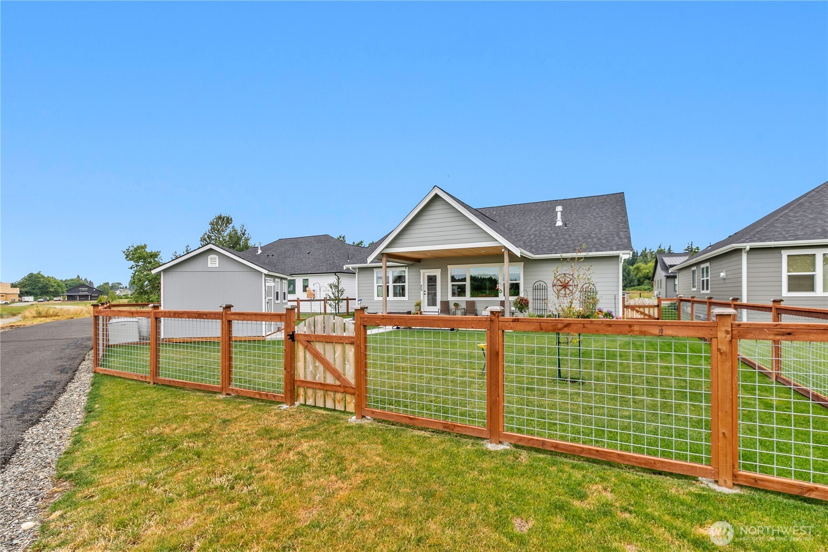 2068 Bowfin Way Lynden, WA 98264 - Photo 30 of 35 a front view of a house with a yard