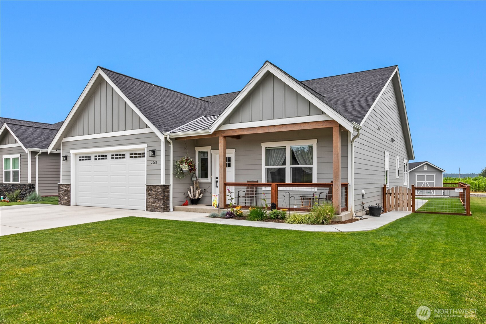 2068 Bowfin Way Lynden, WA 98264 - Photo 3 of 35 a front view of house with yard and green space