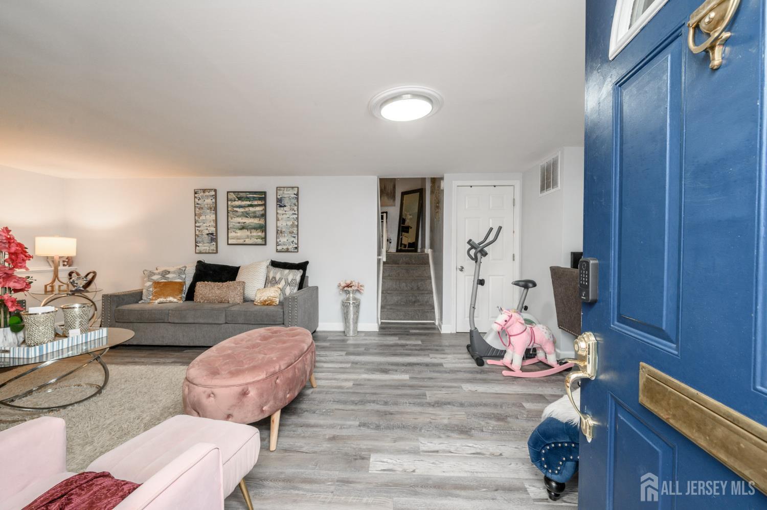 2309 South Cuthbert Drive Lindenwold, NJ 08021 - Photo 3 of 34 a living room with furniture and wooden floor