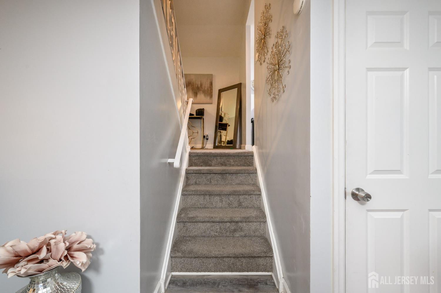 2309 South Cuthbert Drive Lindenwold, NJ 08021 - Photo 9 of 34 a view of a hallway with wooden floor and entryway