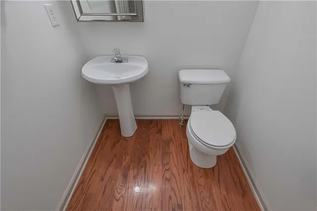 a bathroom with a toilet and a sink