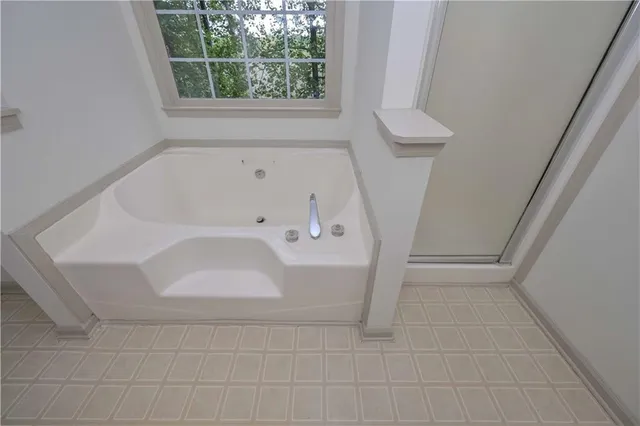 a bathroom with a bathtub