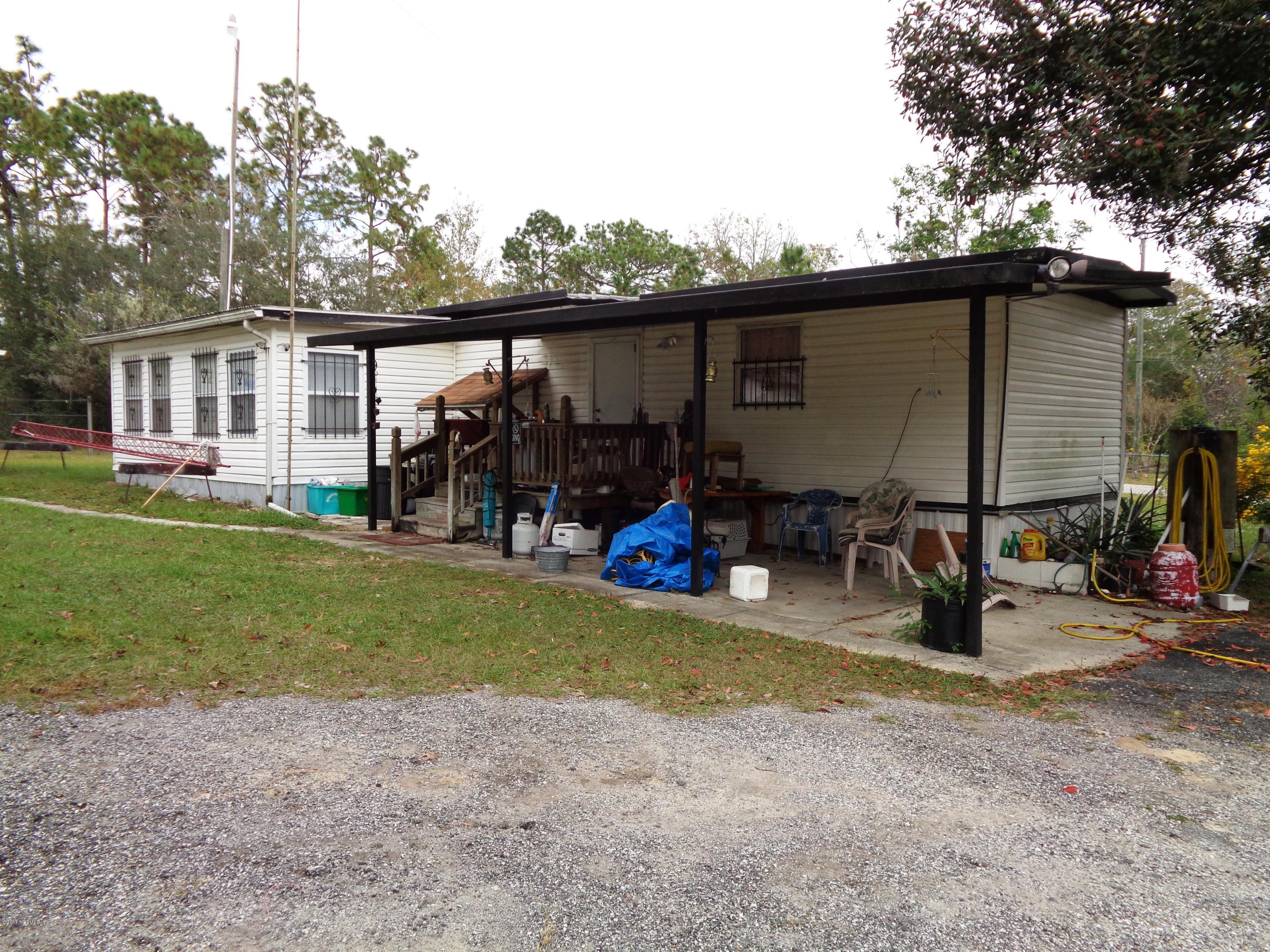 137 Istanbul Street Interlachen, FL 32148 - Photo 3 of 18 a view of a house with backyard