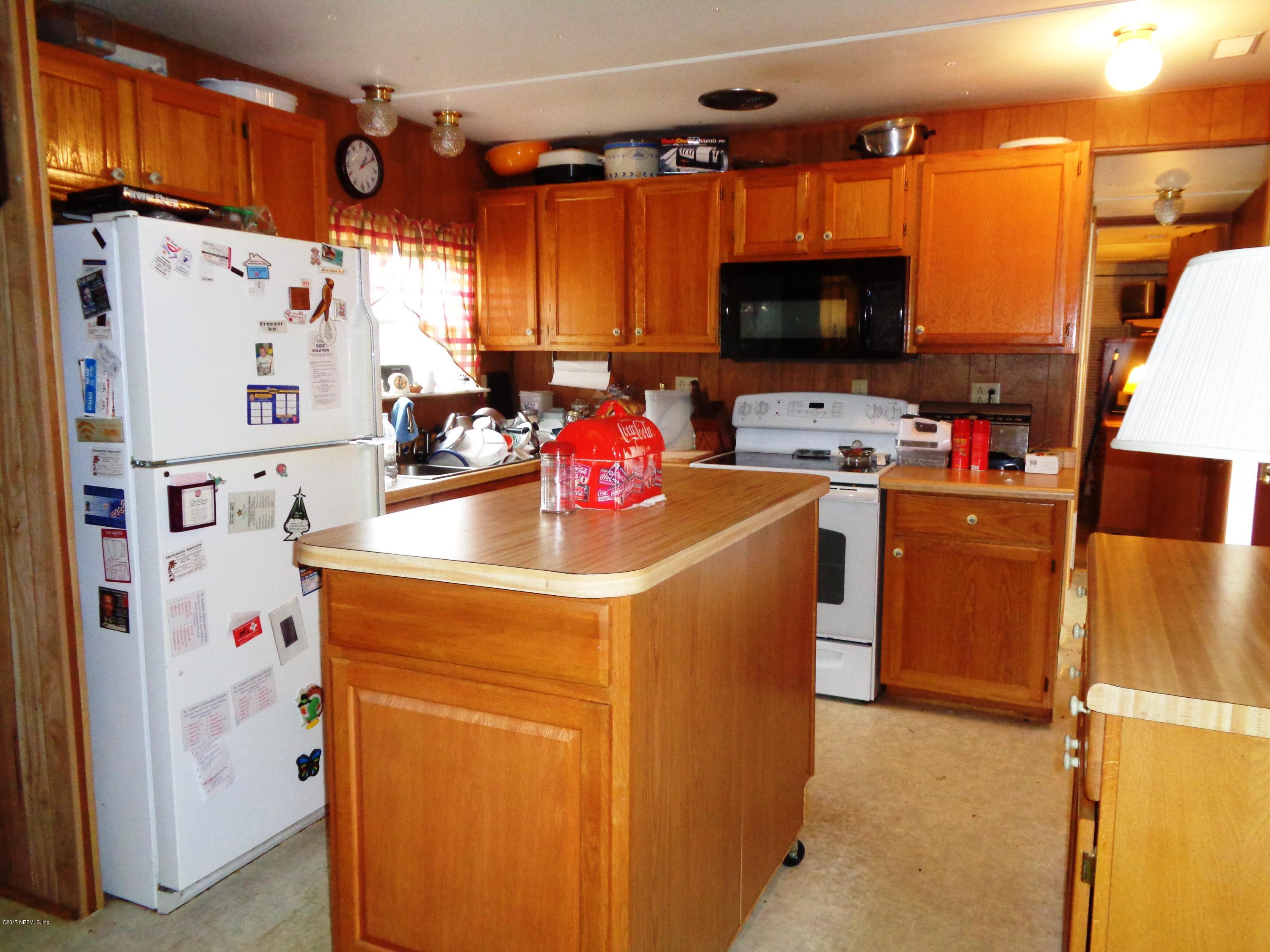 137 Istanbul Street Interlachen, FL 32148 - Photo 5 of 18 a utility room with dryer and washer
