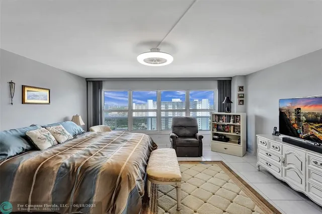 a bedroom with a bed and furniture