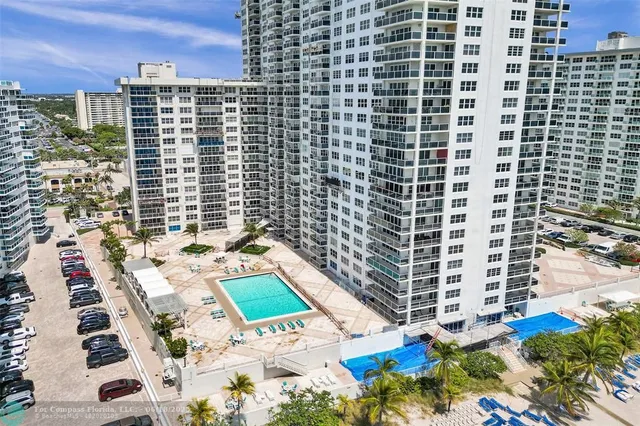 a view of a city with tall buildings