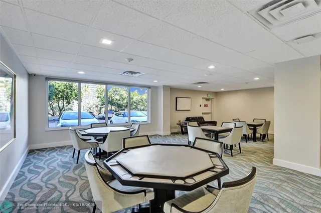 a bed room with furniture and a chandelier
