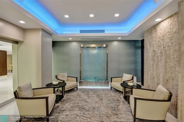 a view of a hallway with livingroom