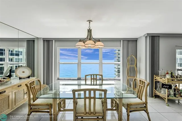 a view of a livingroom with furniture window and wooden floor