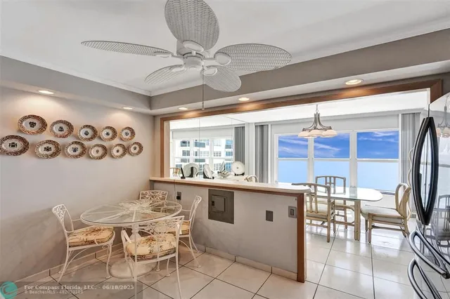 a kitchen with a table and chairs in it