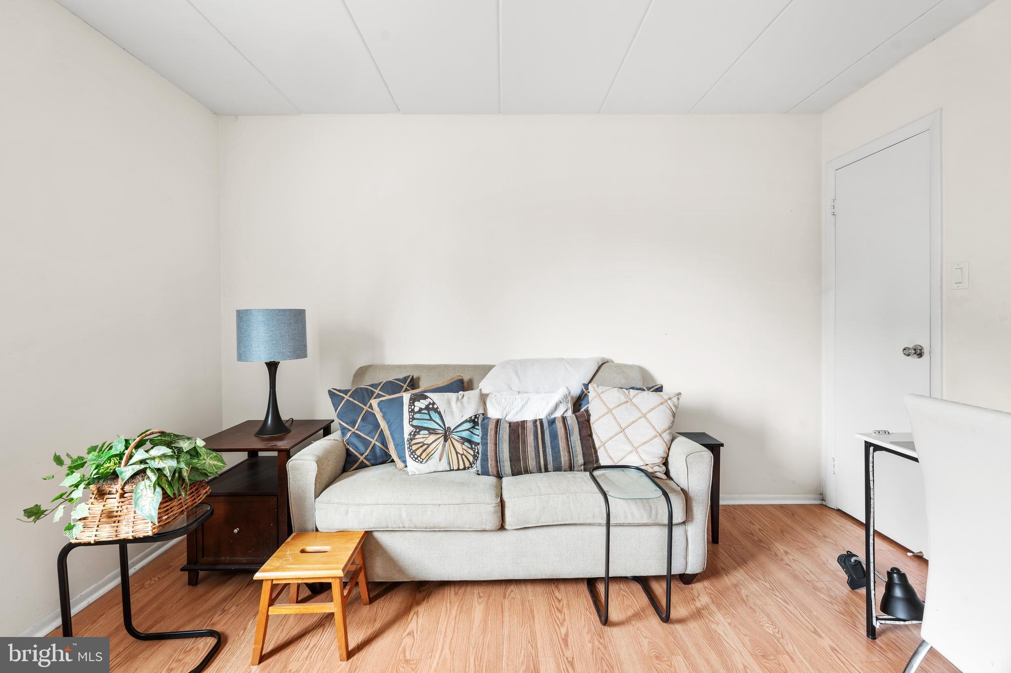 9945 Norwalk Road, Unit 15A Philadelphia, PA 19115 - Photo 19 of 23 a bedroom with a bed and a couch