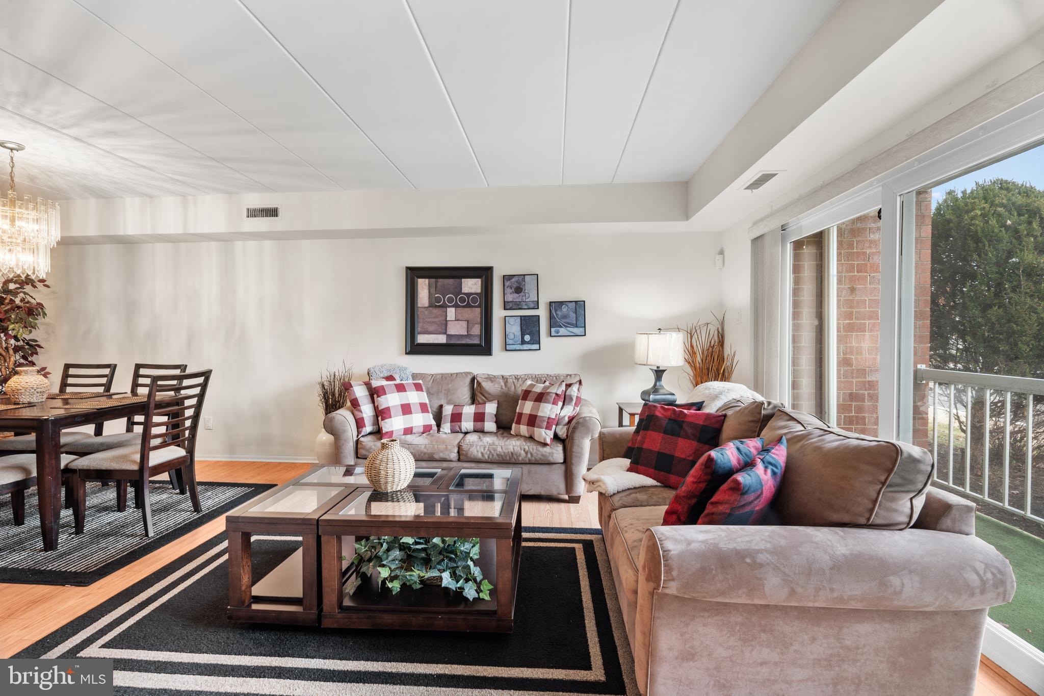 9945 Norwalk Road, Unit 15A Philadelphia, PA 19115 - Photo 3 of 23 a living room with furniture and a table