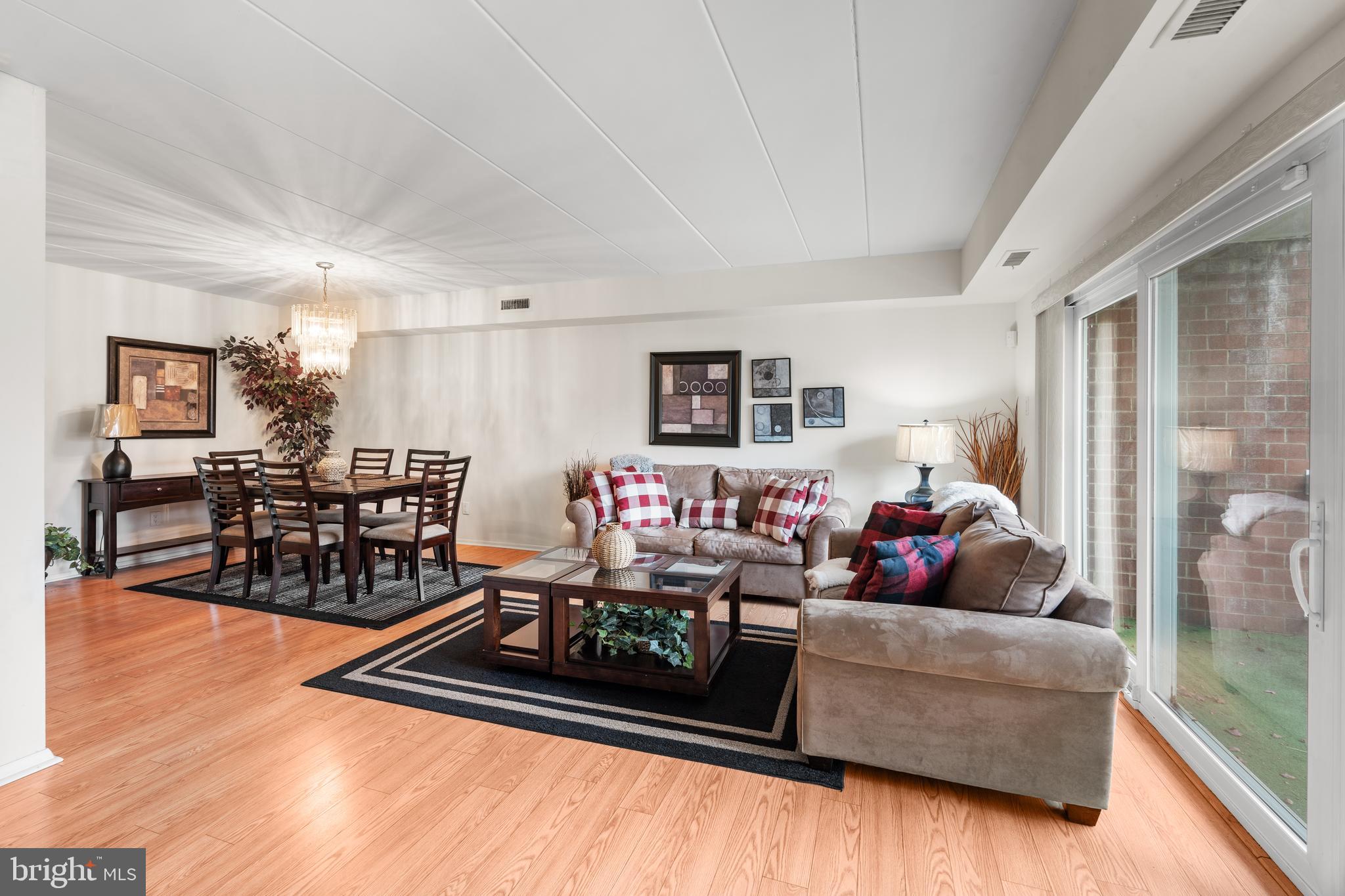 9945 Norwalk Road, Unit 15A Philadelphia, PA 19115 - Photo 6 of 23 a living room with furniture and wooden floor