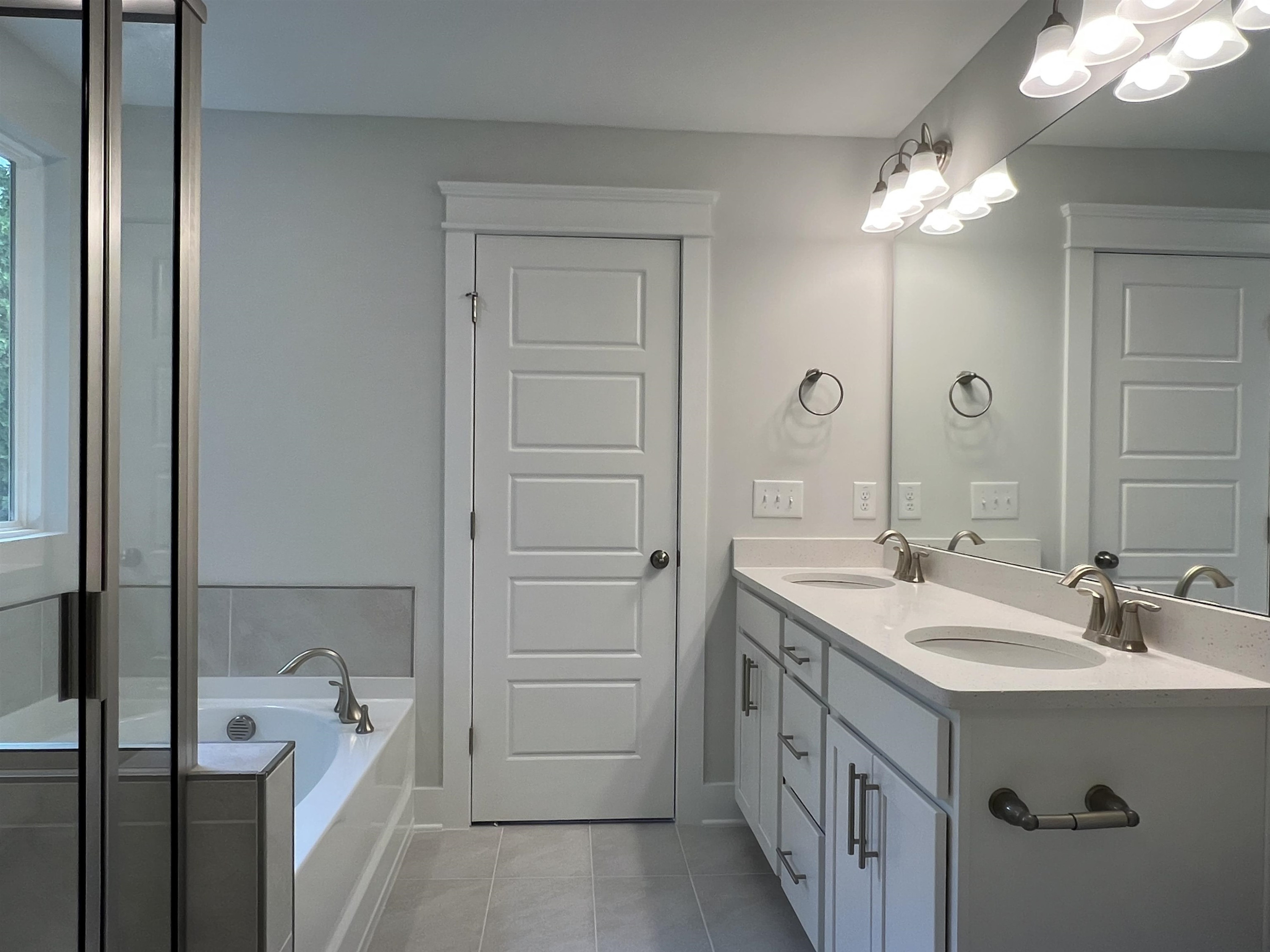 2209 Seneca Road Raleigh, NC 27604 - Photo 14 of 21 a bathroom with a sink a vanity and a mirror